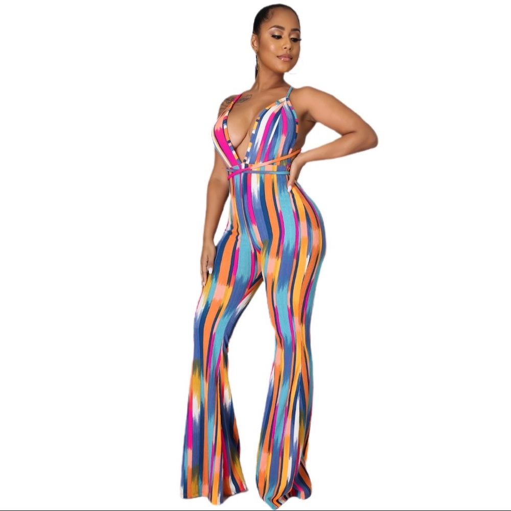 Splash of color jumpsuit available in small medium and large great stretch